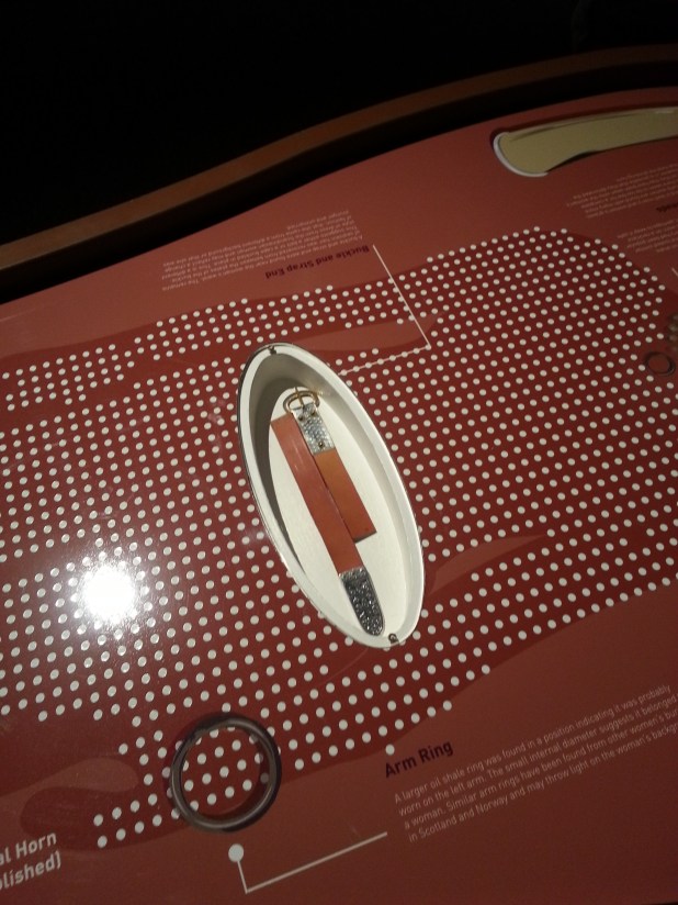 The Buckle and Strap end in the Grave 2 plinth